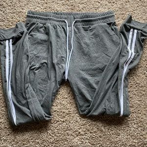 Grey joggers with 2 white strippes